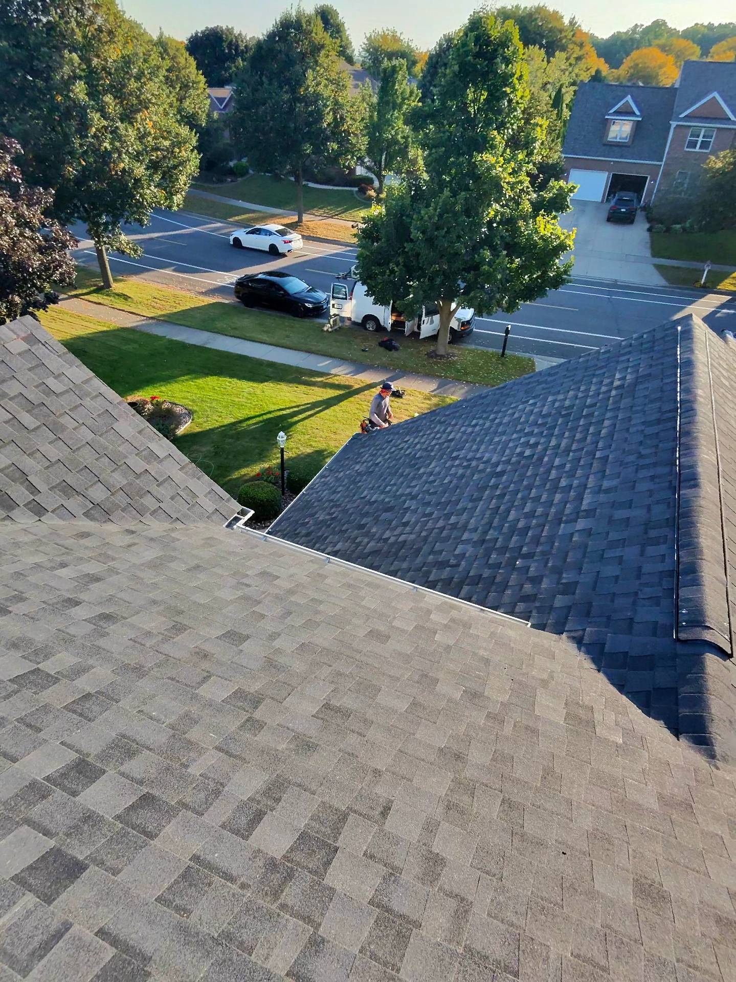 reroof_sun_vault_roofing_Madison_wi_east_side_moire_black_sunset_asphalt_shingle_20250922_close%284%29.jpg